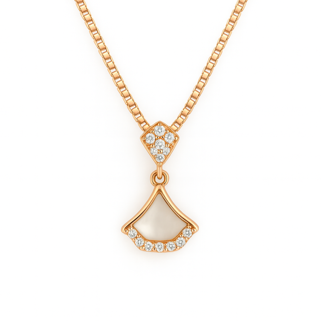 Gold necklace with a pendant on a white background