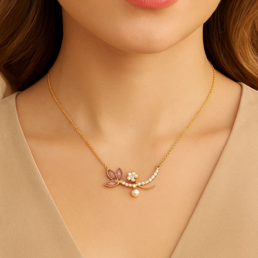 Gold necklace with floral pendant worn by a model