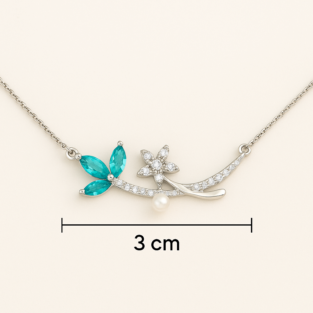 Necklace with turquoise leaf and starfish pendant on a white background