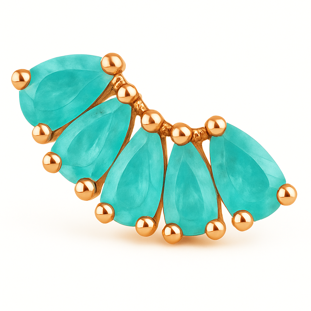 Pair of emerald earrings with rose gold setting on a white background