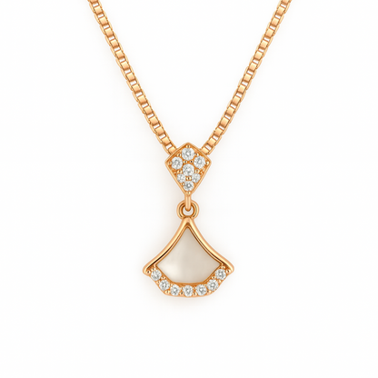 Gold necklace with a pendant on a white background