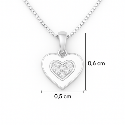 Silver heart-shaped pendant with embedded stones on a white background